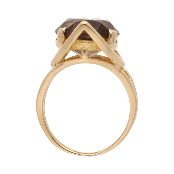 Anillo diseño especial con sintético en oro amarillo 18 kilates.