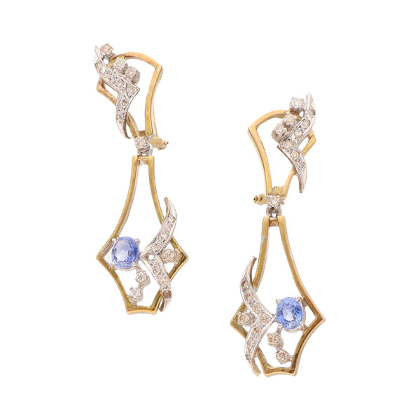 Aretes estilizados con diamantes y sintético en plata paladio y oro amarillo 14 kilates.