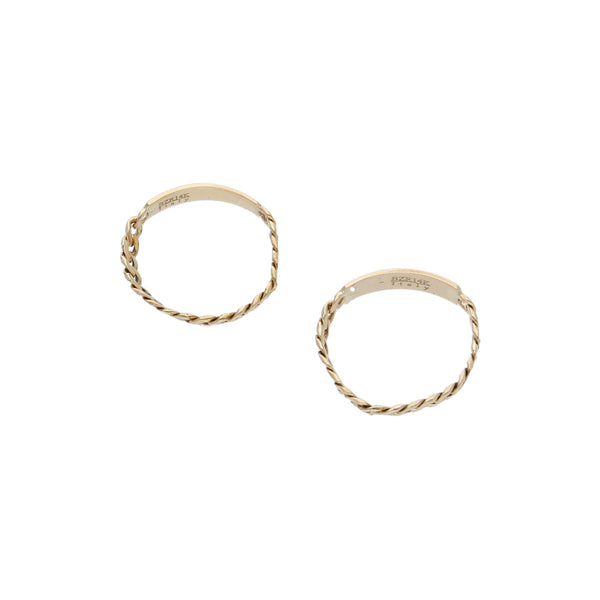 Dos anillos diseño italiano motivo esclava en oro amarillo 14 kilates.