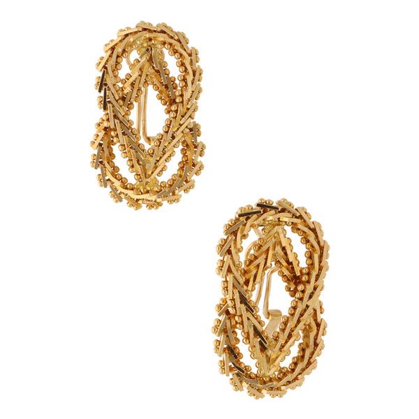 Aretes boleados en oro amarillo 18 kilates.