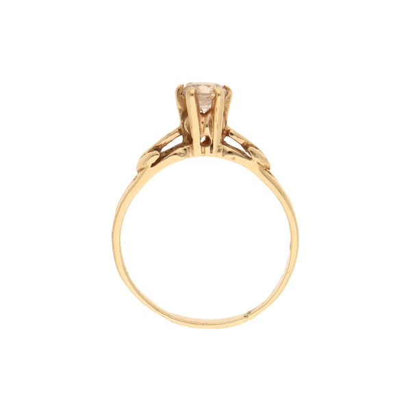 Anillo calado con circonia en oro amarillo 14 kilates.