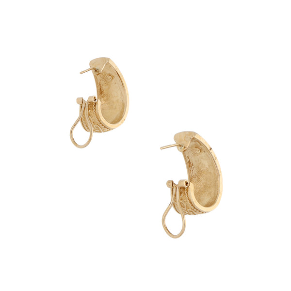 Aretes labrados en oro amarillo 14 kilates.