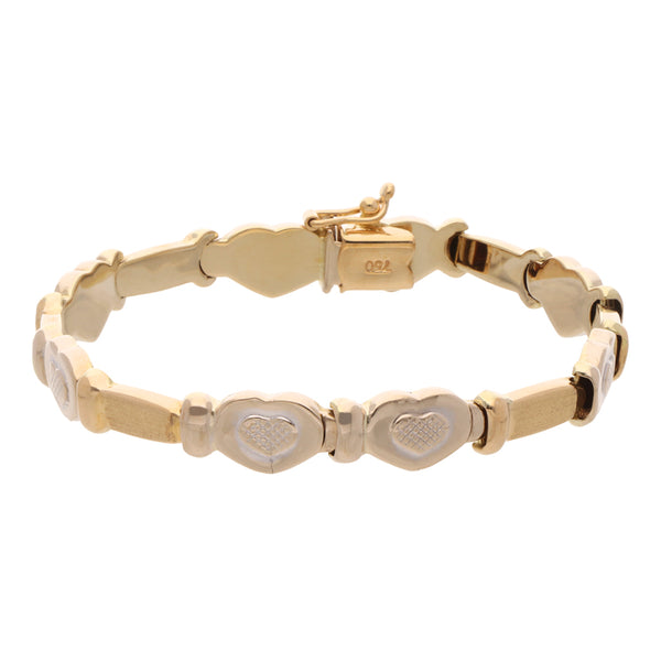 Pulsera eslabón combinado motivo corazones en oro dos tonos 18 kilates.