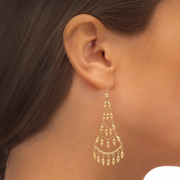 Aretes diseño italiano con colgantes en oro amarillo 18 kilates.