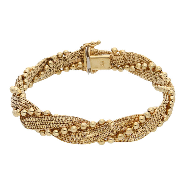 Pulsera eslabón tejido boleado en oro amarillo 18 kilates.