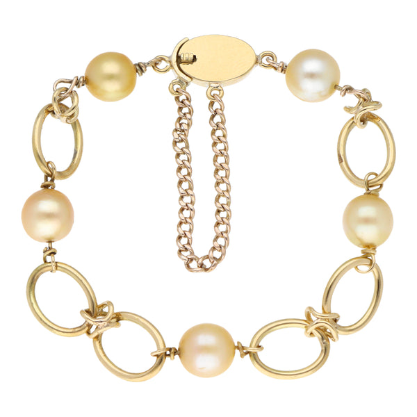 Pulsera eslabón combinado con perlas en oro amarillo 16 kilates.