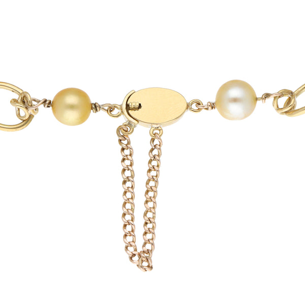 Pulsera eslabón combinado con perlas en oro amarillo 16 kilates.