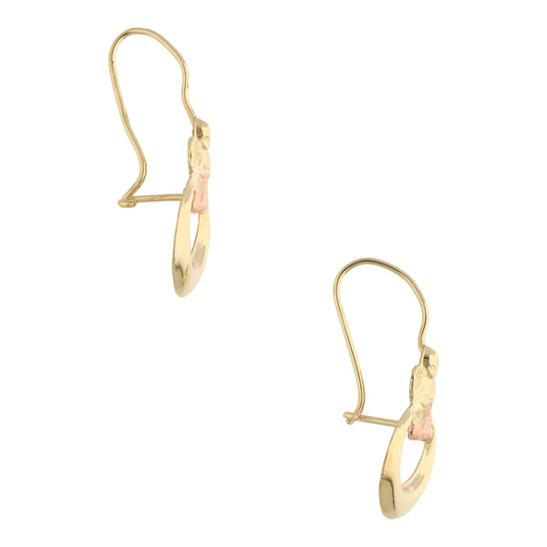 Aretes laminados en oro dos tonos 14 kilates.