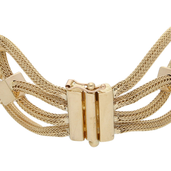 Pulsera cuatro hilos eslabón tejido trenzado con cubos en oro amarillo 14 kilates.