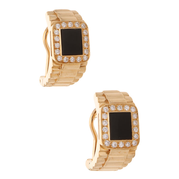 Aretes diseño especial con ónix y diamantes en oro amarillo 18 kilates.