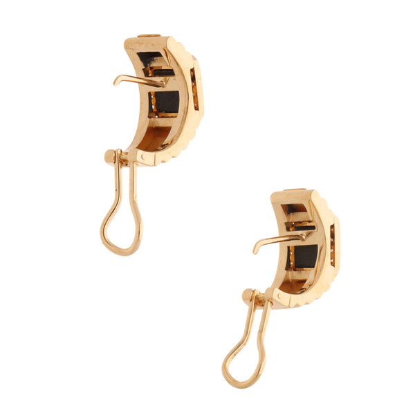 Aretes diseño especial con ónix y diamantes en oro amarillo 18 kilates.