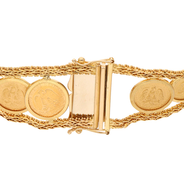 Pulsera eslabón boleado con trece monedas de dos pesos oro mexicano 21.6 kilates y oro amarillo 14 kilates.