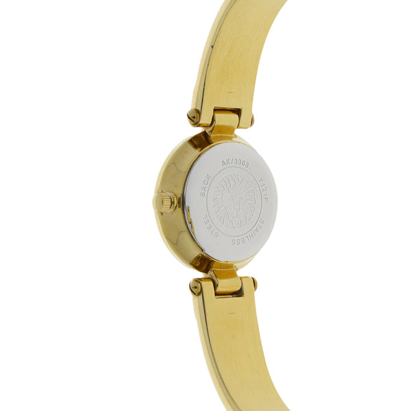 Reloj Anne Klein para dama en acero chapa.