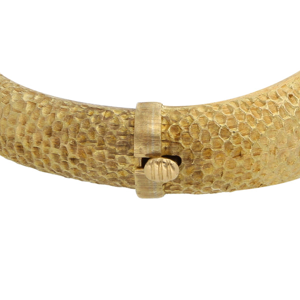 Pulsera de arillo articulada motivo sirena con diamantes en oro dos tonos 18 kilates.