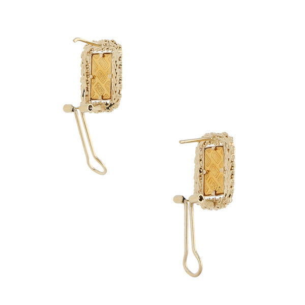 Aretes boleados en oro amarillo 14 kilates.