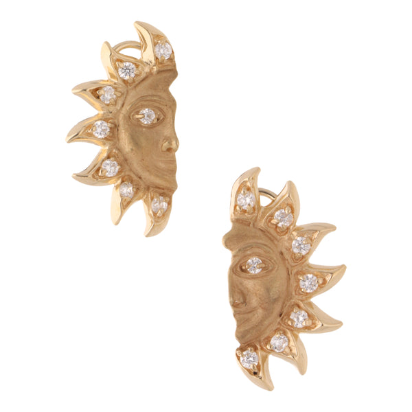 Aretes diseño especial motivo sol con circonias en oro amarillo 14 kilates.