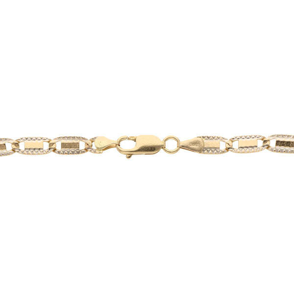 Pulsera eslabón combinado diamantado en oro amarillo 14 kilates.