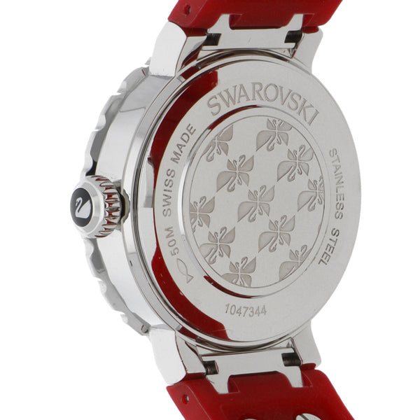 Reloj Swarovski para dama en acero correa caucho.