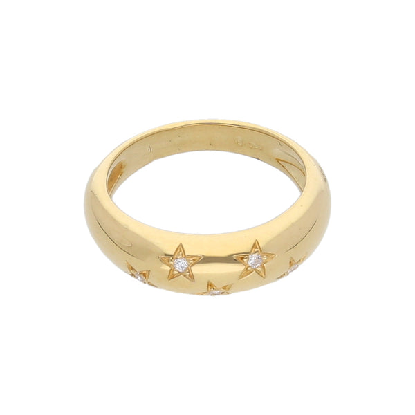 Anillo estilizado con diamantes motivo estrellas en oro amarillo 18 kilates.