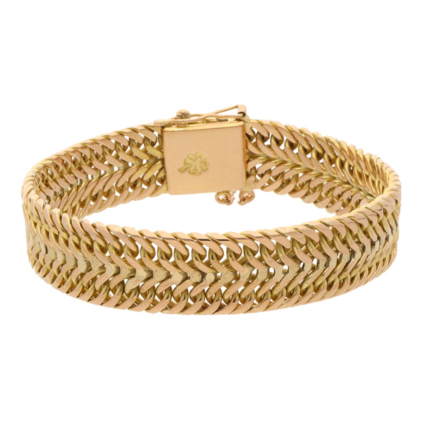 Pulsera eslabón palmeado en oro amarillo 18 kilates.