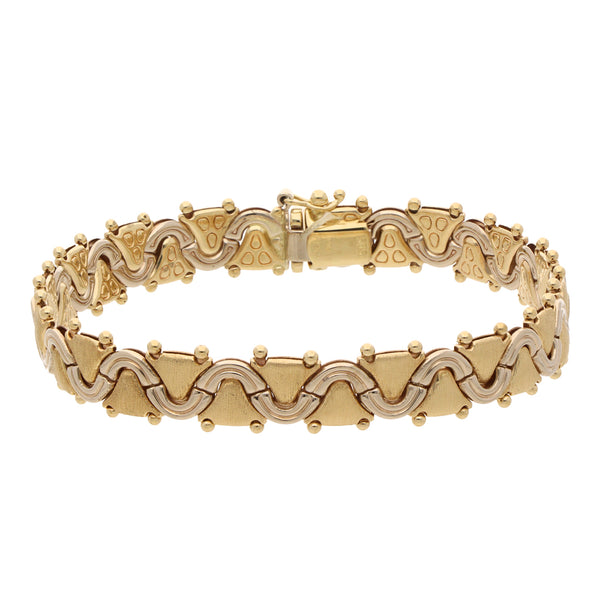 Pulsera diseño italiano en oro dos tonos 14 kilates.