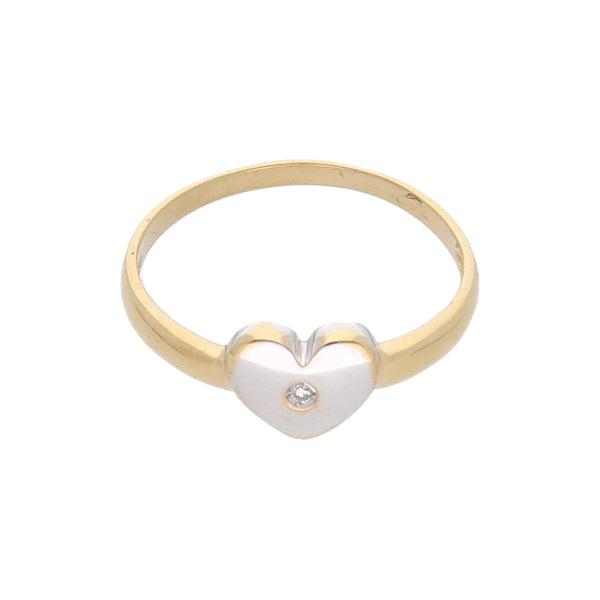 Anillo diseño especial con diamante motivo corazón en oro dos tonos 18 kilates.