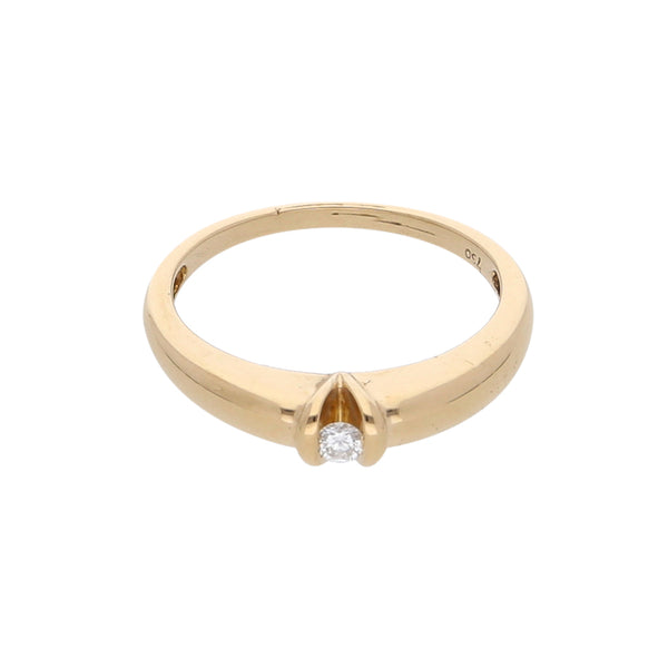 Anillo solitario con diamante en oro amarillo 18 kilates.