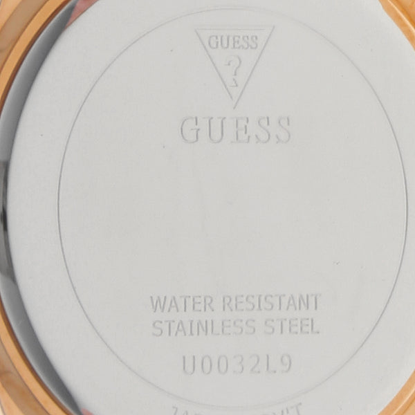 Reloj Guess para dama en acero chapa correa caucho