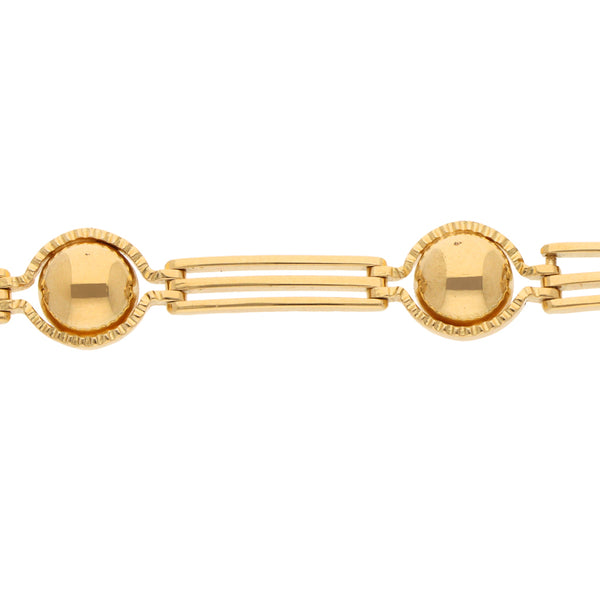 Pulsera eslabón articulado combinado en oro amarillo 18 kilates.