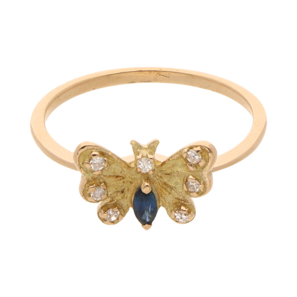 Anillo diseño especial motivo mariposa con diamantes y zafiro en oro amarillo 14 kilates.