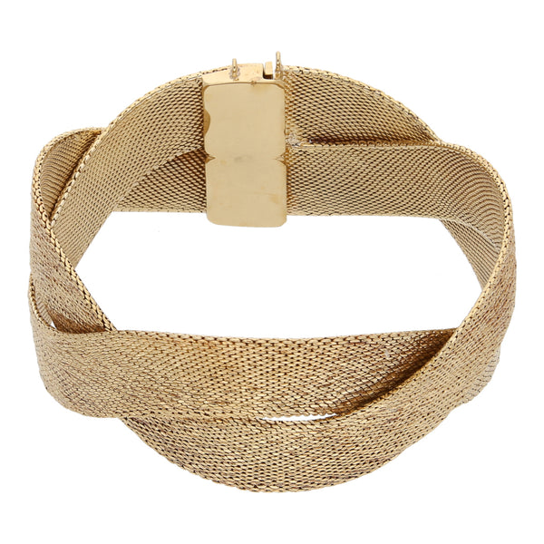 Pulsera eslabón tejido trenzado en oro amarillo 18 kilates.