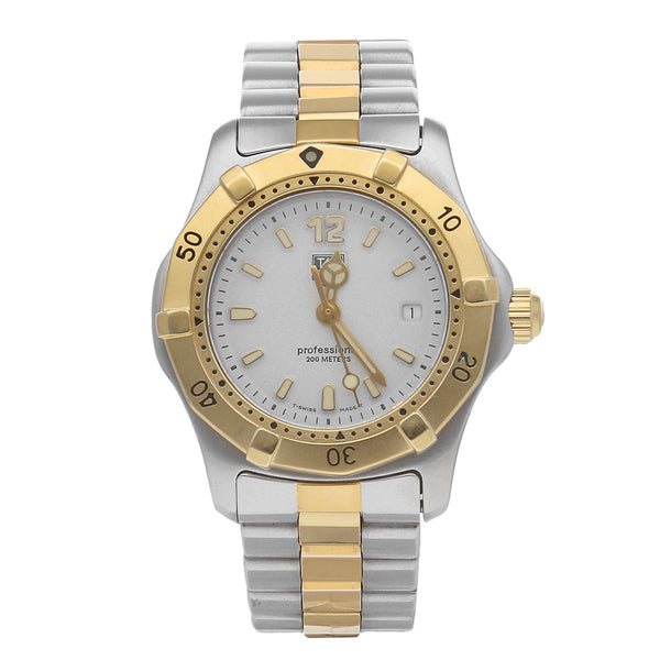 Reloj Tag Heuer para dama modelo Professional bisel en oro amarillo 18 kilates.