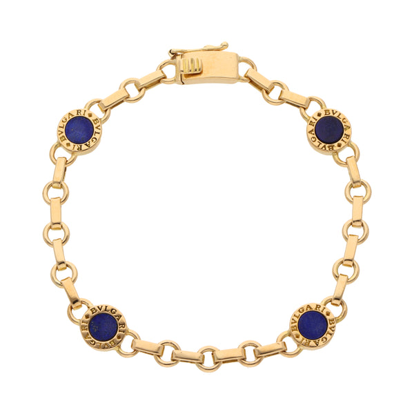 Pulsera eslabón combinado con lapislazuli en oro amarillo 18 kilates.