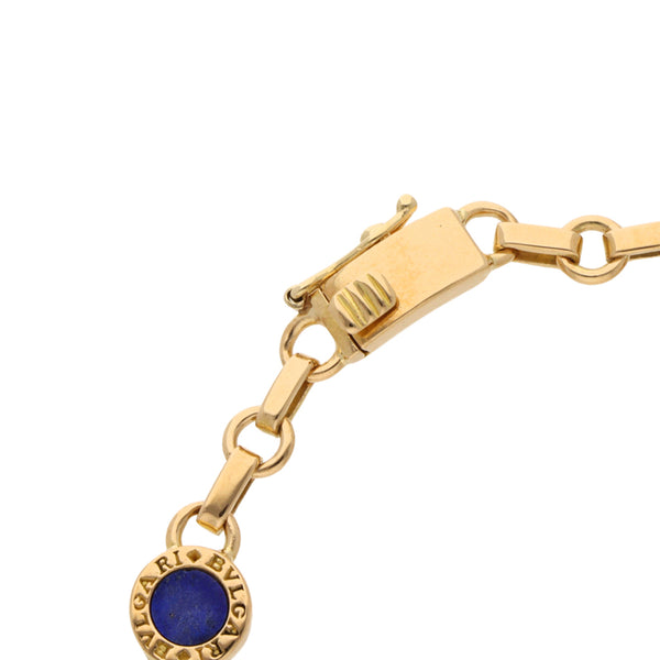 Pulsera eslabón combinado con lapislazuli en oro amarillo 18 kilates.