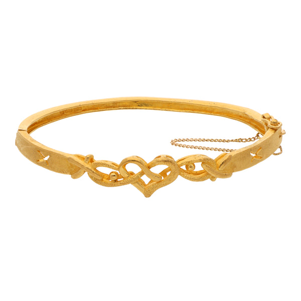 Pulsera de arillo articulada motivo corazón en oro amarillo 24 kilates.