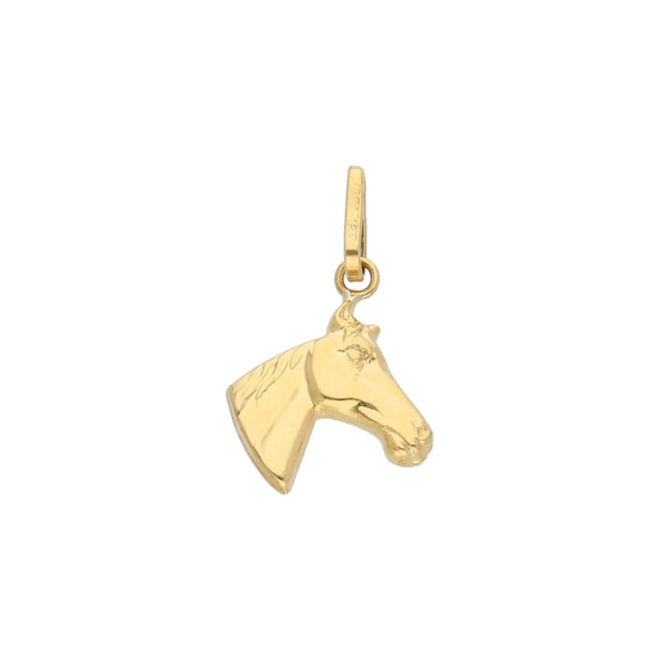 Dije diseño especial motivo caballo en oro amarillo 18 kilates.