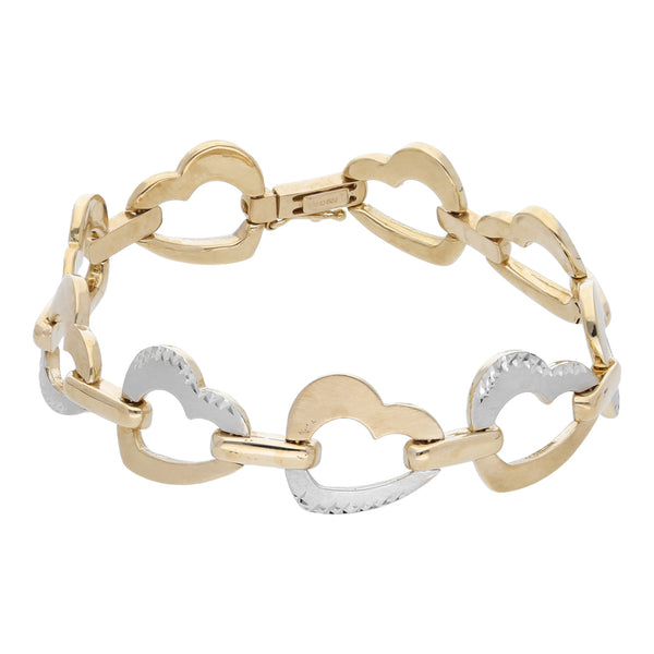 Pulsera eslabón articulado motivo corazones en oro dos tonos 14 kilates.