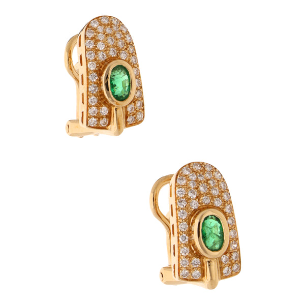 Aretes estilizados con esmeraldas y diamantes en oro amarillo 18 kilates.