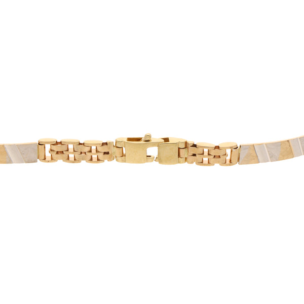 Pulsera diseño italiano eslabón combinado en oro dos tonos 14 kilates.