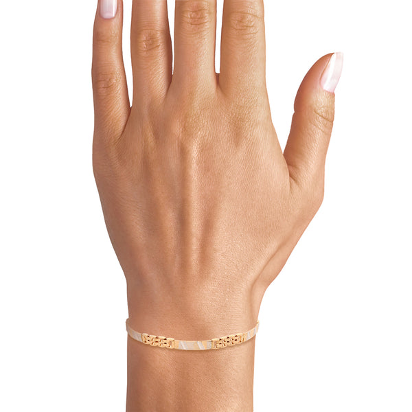 Pulsera diseño italiano eslabón combinado en oro dos tonos 14 kilates.
