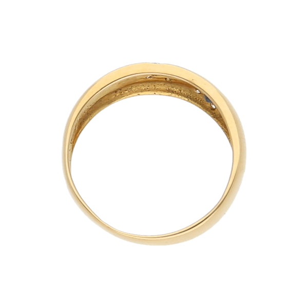 Anillo liso con sintéticos en oro amarillo 18 kilates.