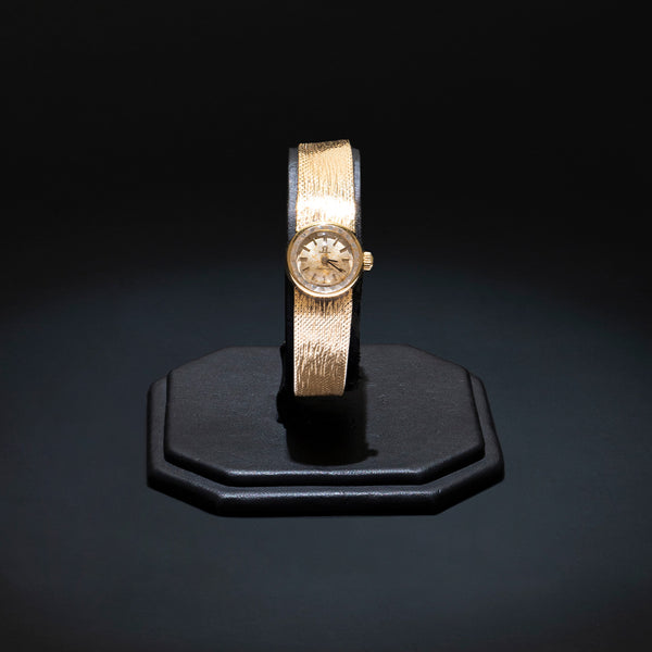 Reloj Omega para dama modelo Ladymatic en oro amarillo 18 kilates.