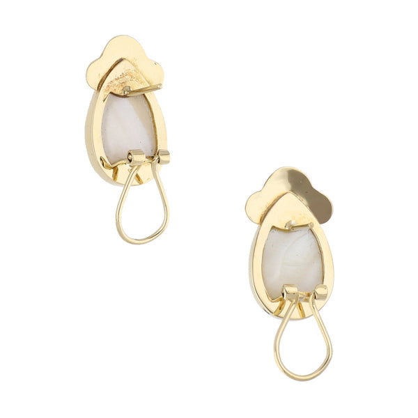 Juego de anillo y aretes diseño especial con medias perlas en oro amarillo 14 kilates.