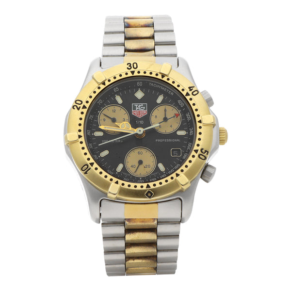 Reloj Tag Heuer para caballero modelo Professional bisel en oro amarillo 18 kilates.