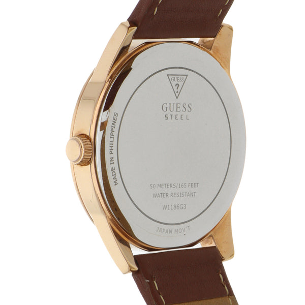 Reloj Guess para caballero en acero chapa correa piel.