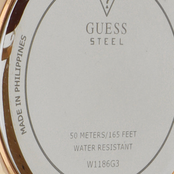 Reloj Guess para caballero en acero chapa correa piel.