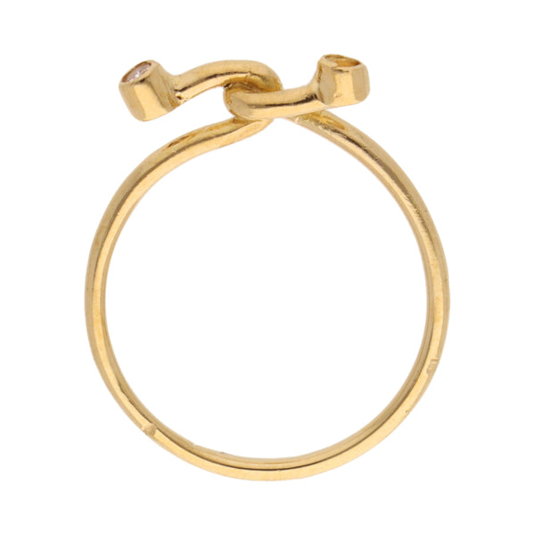 Anillo estilizado con sintético en oro amarillo 18 kilates.