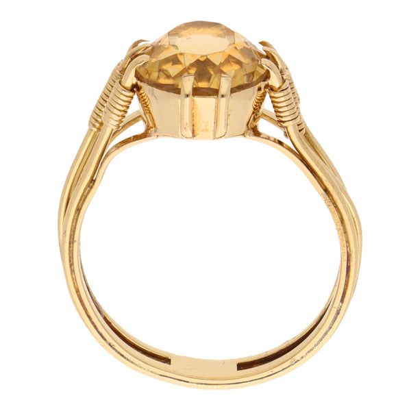 Anillo diseño especial con sintético en oro amarillo 18 kilates.