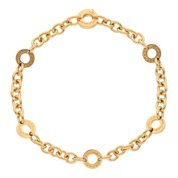 Pulsera eslabón cruzado firma Bvlgari en oro amarillo 18 kilates.