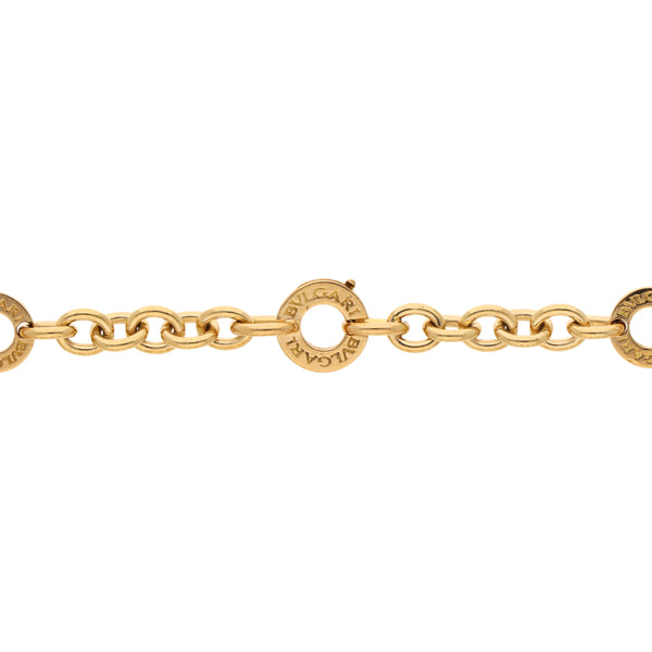 Pulsera eslabón cruzado firma Bvlgari en oro amarillo 18 kilates.